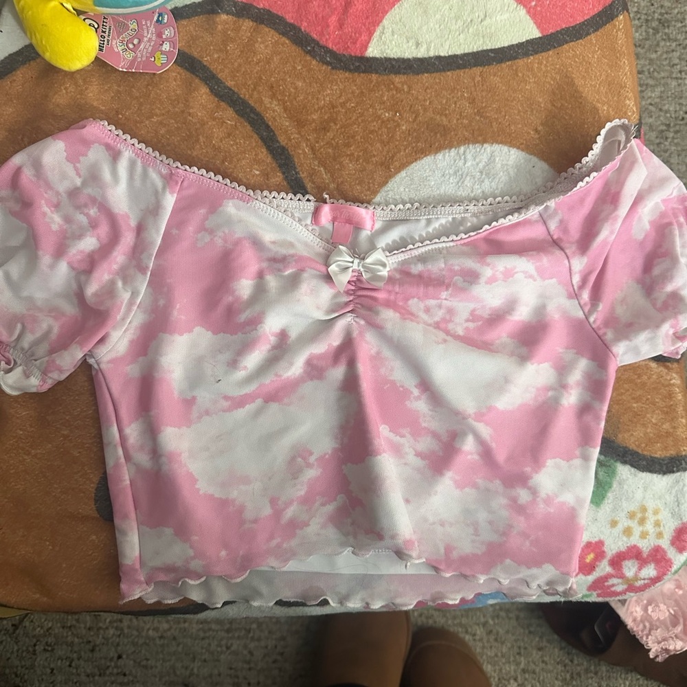 Sugar thrills top size medium would fit a small :)